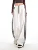 Pantalones blancos de pierna ancha con ribete de encaje a rayas para mujer, nuevo estilo de otoño, fluidos, holgados, adelgazantes, pantalones casuales deportivos, Tío Zanahoria