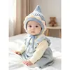 Bonito gorro de lana tejido para bebés en otoño e invierno, unisex, con protección para las orejas y características a prueba de viento, adecuado para niños pequeños como gorro de invierno