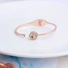 Pulsera de proyección abierta de la tendencia de moda simple japonesa y coreana un ciervo te tiene 100 idiomas Te amo joyería de proyección