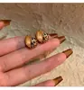 Perforaciones Metálicas Vintage con Estampado de Leopardo, Pendientes Circulares de Lujo de Alta Gama con un Diseño de Nicho y Estilo Versátil