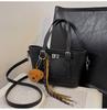 Bolsos de Moda Populares Transfronterizos para Mujer, Otoño e Invierno 2026 Nuevo Bolso Versátil de Hombro Cruzado, Bolso Cubo Casual