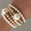 Pulseira Cruzada Europeia e Americana Nova Moda Pérola Imitação Exagerada Contas Redondas 5 Peças Deslizar Usando Conjunto de Pulseiras Criativas