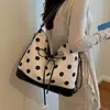 Bolsa de lunares con lazo súper popular del verano para mujer, nueva bolsa versátil para el hombro o debajo del brazo 2026, bolsa casual de doble hombro para el día a día