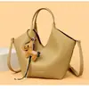 Bolso Cubo Casual de Nicho Estilo Coreano para Mujer 2026 Nuevo Estilo Minimalista Bolso Cesta Bolso de Hombro Simple para Mujer