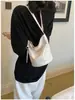 2026 Verano Nuevo Bolso Cubo Versión Coreana Simple Color Sólido Bolso de Mano Gama Alta Nicho Bolso de Hombro para Viajes Diarios