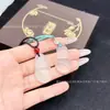 Colgante de calcedonia de hielo de alta calidad, patrón de nube de gelatina de lichi, candado auspicioso que cumple deseos, ágata de hielo de luz de luna blanca, amuleto ahuecado "Sin Preocupaciones", colgante de paz