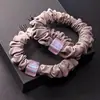 Accesorios coreanos para el cabello al por mayor, cuerda para el cabello, anillo para el cabello grueso, anillo para intestino grande, tela, lazo simple para el cabello, bola para la cabeza, lazo para coleta, estuche de cuero