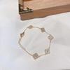 Versión alta Rosa con incrustaciones de diamantes Trébol de Cuatro Hojas Caliente blanco concha completo diamante microincrustado pulsera exquisita de alta calidad pulsera de lujo ligero para mujeres