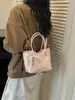 Bolso tejido de nicho de alta gama nuevo para primavera y verano, bolso cubo, bolso tipo empanada, bolso de axila simple y elegante de alta gama para mujer