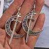 Pendientes de moda transfronterizos europeos y americanos con forma de luna, espada y cruz, estilo retro étnico, con colgante en forma de corazón.