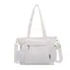 Bolsa de lona simples para mulheres, novo modelo 2026, grande capacidade, bolsa tote versátil, adequada para estudantes universitários indo para a aula, bolsa transversal