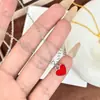 Colar Exquisito Estilo Francês Coração com Gotejamento de Óleo Dupla Face para Mulheres, Luxo Leve Moda de Alto Padrão Nicho Acessório em Formato de Coração Pulseira Corrente para Clavícula