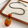 Collar de Cordón de Cera con Cuentas de Gota de Agua Colgante Largo Estilo Étnico Vintage Cadena para Suéter Joyería Versátil de Nicho para Mujeres con un Toque de Alta Gama