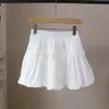 [BiZheng] Nueva Falda de Línea A Adelgazante Estilo Coreano Primavera/Verano 2026 Falda Abullonada para Mujer Falda de Botón de Flor 5981