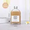 2 Duas pequenas garrafas de vinho garrafa de vinho de frutas garrafa de bebida de café garrafa de vidro de licor de suco de frutas criativa garrafa de bebida transparente para levar