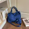 Bolsa de lona de gran capacidad para mujer, nuevo modelo de otoño 2026, adecuada para la escuela y el trabajo, bolso tote, bolso de hombro y cruzado de gran capacidad