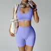 Nuevo conjunto de yoga transfronterizo: Shorts de fitness tipo durazno sin costuras que levantan los glúteos con almohadillas en el pecho, top deportivo y sujetador de yoga