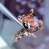 Zhenrong temu venda quente transfronteiriça anel de diamante moissanita simulação feminino micro cravejado todo diamante quadrado almofada anel de diamante champanhe atacado feminino