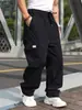 Otoño 2024 Nuevos Pantalones Casuales de Color Sólido Sueltos con Etiqueta de Cuero Bolsillos Múltiples de Grulla Pantalones Básicos Pantalones Casuales Talla Grande