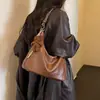 Bolso tipo dumpling de cuero suave con patrón de lichi para mujer, nuevo bolso tote vintage otoño e invierno 2026, bolso cruzado de gran capacidad para el día a día
