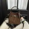 2026 Nuevo Bolso de Hombro Cruzado de Hombro Único para el Trabajo Moda Retro Mate Bolso de Cubo de Mano de Moda de Nicho para Mujer
