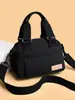 Bolsa Feminina Moderna e Estilosa 2026 Novo Modelo Simples Leve Bolsa de Ombro Versátil Impermeável Nylon Bolsa Transversal Bolsa de Mãe