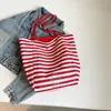 Bolsa de Lona Listrada Bolsa de Ombro Feminina Novo Estilo Coreano Versátil Bolsa Tote de Grande Capacidade Bolsa para Estudante e Commuter Bolsa de Ombro