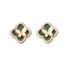 Pendientes de Mariposa y Trébol de Cuatro Hojas para Mujer, Modernos y Creativos, Pendientes de Hierba para Olvidar tus Preocupaciones, de Moda y Versátiles, Accesorios para Orejas de Gama Alta de Nicho