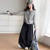 Ropa de Otoño para Niñas Conjunto con Sudadera con Capucha 2026 Nuevo Estilo Estudiantes de Secundaria Niñas Sudadera con Capucha Rayada Pantalones de Pierna Curva Conjunto de Dos Piezas Ropa Infantil
