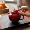 Tetera Roja Festiva para el Hogar con Esmalte de Color Mineral Original y Estampado Dorado, Juego de Té Kung Fu Estilo Chino con Filtro de Bola y Asa de Mano