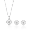 {Set}Aretes y Collar de Aleación de Cobre de Trébol de Cuatro Hojas para Mujer 2025 Simple Accesible Lujo Elegante Diseño de Nicho Cadena para Clavícula