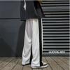 Pantalones casuales finos de primavera y verano para hombre, pantalones deportivos holgados de estilo coreano a la moda con puntera en la pierna, pantalones deportivos atractivos que combinan con todo.