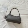 Bolso de axila de nicho estilo coreano Shuai Mi Jia para mujer, nuevo bolso de mano y bandolera de moda de lujo ligero y elegante para principios de otoño de 2026