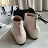 Botas altas largas hechas a mano en Guangzhou, estilo minimalista, de piel de becerro de primera capa, con elevación interior, puntera cuadrada, sin cordones, planas, de moda