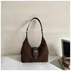Bolso de mano sencillo y casual para mujer 2026 nuevo bolso de hombro retro coreano bolso cruzado de nicho para el trabajo