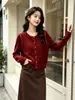 Chaqueta cárdigan de punto de tres hilos de terciopelo Andy engrosada que reduce la edad, con bloques de color, para mujer, nuevo suéter de otoño e invierno 2026