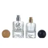 En Stock 30ml 50ml 100ml Botella de Perfume Fondo Volcánico, Botella Vacía Recargable, Botella Transparente Cilíndrica de Fondo Grueso con Atomizador