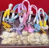 Colgante Zodiaco con Concha de Agua Dorada con Grabado, Llavero para Cadena de Teléfono Móvil Regalo, Suministro Directo del Fabricante, Soporta Logo