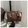 Nova Bolsa de Ombro Feminina com Textura de Crocodilo e Padrão de Peixe Elegante Versátil da Moda Grande Capacidade para o Dia a Dia Bolsa Tote Comércio Exterior Atacado