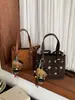Bolsa de tela estampada única y linda para mujer, nueva colección otoño 2026, bolso de hombro/bolso cruzado simple, moderno y elegante