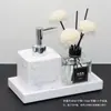 Kit de artículos de tocador de baño europeo para hotel Baño de habitación modelo Adornos de baño Botella de desinfectante de manos Botella de loción Juego de bandeja