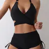Comercio exterior europeo y americano nueva tela especial sexy de tirantes moda Cruz Hueco con cordones bikini dividido para mujer
