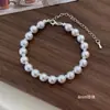 Colección de Collar Pulsera de Plata Rota Perla Diseño de Nicho para Mujer Lujo Accesible de Gama Alta Cadena para Clavícula Joyería Nueva de Verano
