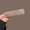 Diseño de pinza para el pelo con borla sentido de diseño nicho pinza BB exquisita moderna sentido de alta gama nuevo estilo chino pinza para el pelo pinza de pico de pato Yiwu al por mayor
