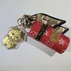 2027 Año Zodiacal de la Oveja Llavero Sobre Rojo Oveja Oveja Obtener Agua de la Fortuna Cubo Bolsa Tener Dinero Para Gastar Colgante Pequeño Personalizado