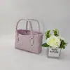 Venda por atacado de fábrica cesta quadrada portátil de palha bolsa de praia de verão nova moda bolsa balde versátil bolsa de palha