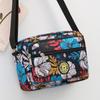 Bolsa de pano de flores Nova bolsa crossbody feminina Pano Oxford Bolsa de mãe de meia-idade e idosa Bolsa Bolsa de ombro multicamadas Bolsa de lona