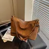 Bolso de mujer vintage de alta gama 2026 nuevo bolso de hombro versátil, bolso de axila de moda para el trabajo, bolso casual de lujo ligero para mujer
