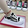 Zapatos de galleta para mujer 2022, nuevos zapatos de exterior de moda, de alta apariencia y combinables, en línea, zapatos de lona rojos populares para estudiantes.
