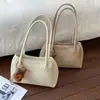Bolso tote grande de color liso, alta capacidad, para el trabajo y los desplazamientos, para mujer, nuevo modelo 2026, bandolera casual de moda, bolso grande